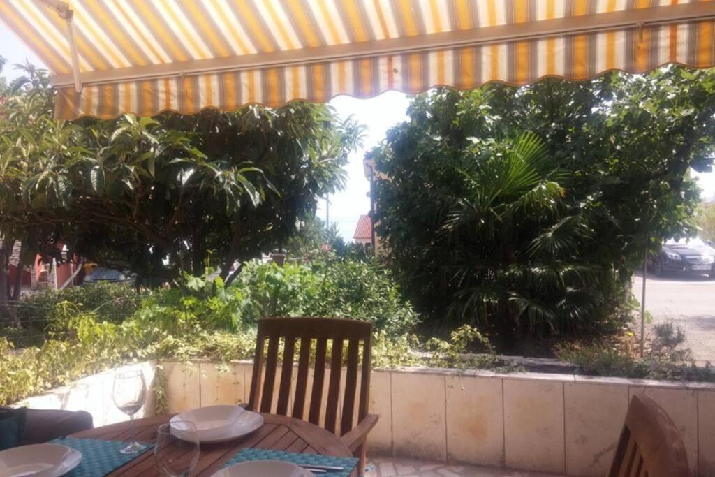 House Near Sea Coast With Surrounding Krk Town